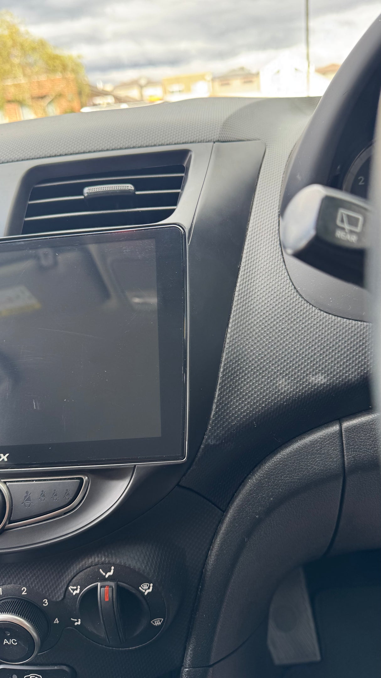 Hyundai accent interior with dashboard and air vent right side