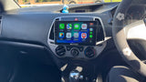 Hyundai i20 PB Car dashboard with an Extnix navigation system headunit installed and displaying  Wireless Apple Carpla app icons.