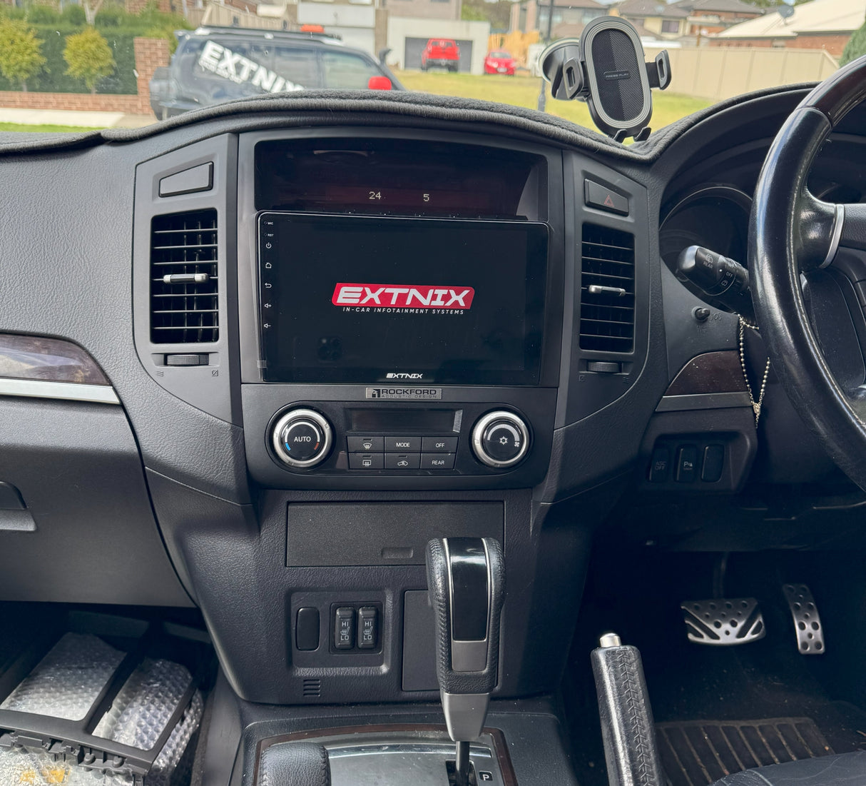 EXTNIX Premium Mitsubishi PAJERO Wireless Apple CarPlay Android Auto Infotainment System Headunit Rockford Compatible - logo